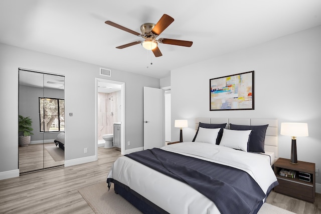 empty room featuring plenty of natural light, light wood-type flooring, and ceiling fan