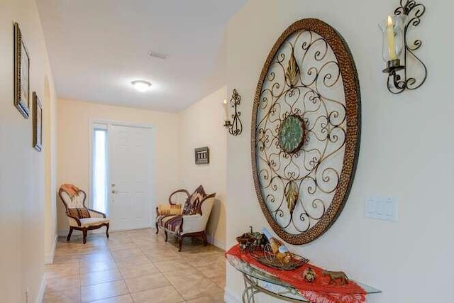 entryway featuring light tile patterned floors