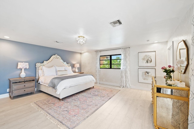 bedroom featuring light hardwood / wood-style flooring