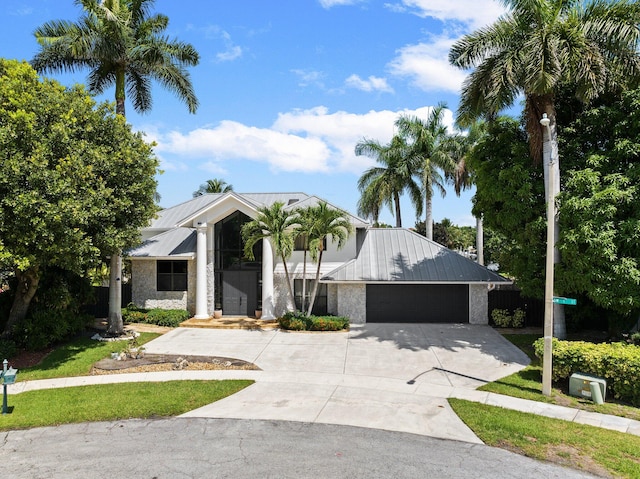 view of front of home with a garage