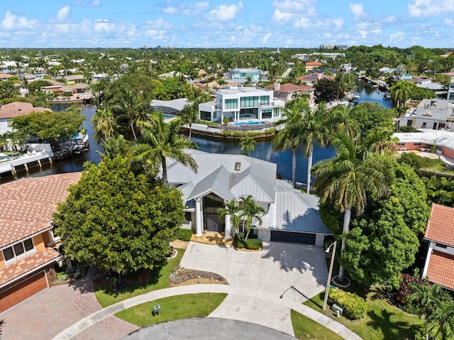 birds eye view of property featuring a water view