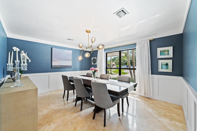 dining area with a notable chandelier and light tile patterned floors