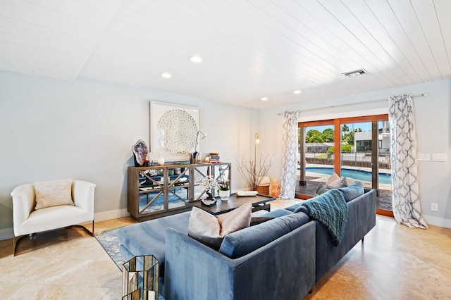 living room with light tile patterned flooring