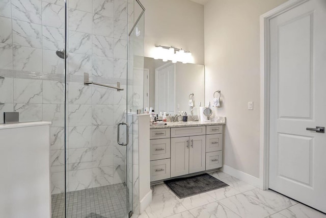 bathroom with vanity and a shower with shower door