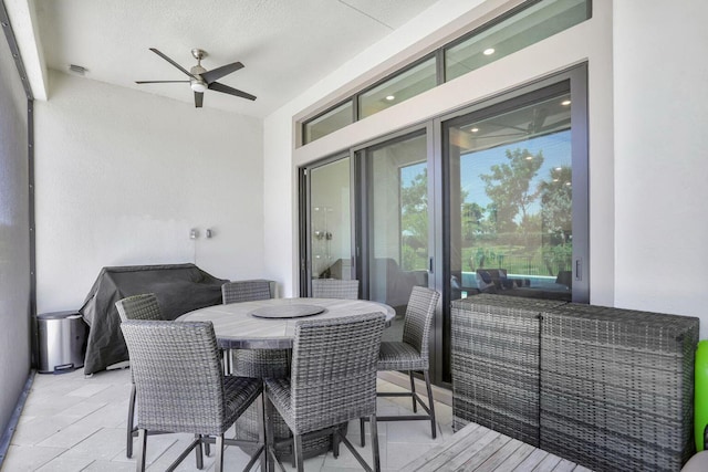 exterior space featuring a patio and ceiling fan