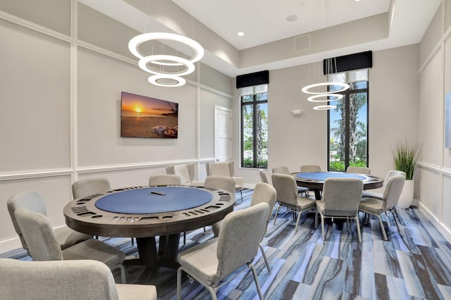 interior space featuring hardwood / wood-style flooring and a chandelier