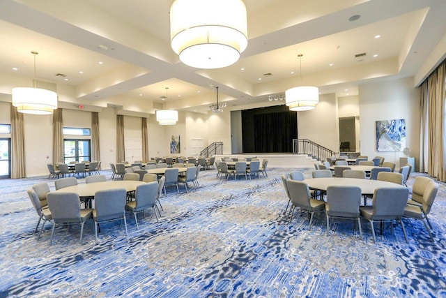 dining room with a high ceiling