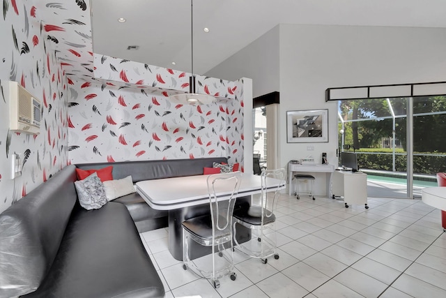 dining area featuring high vaulted ceiling and light tile patterned floors