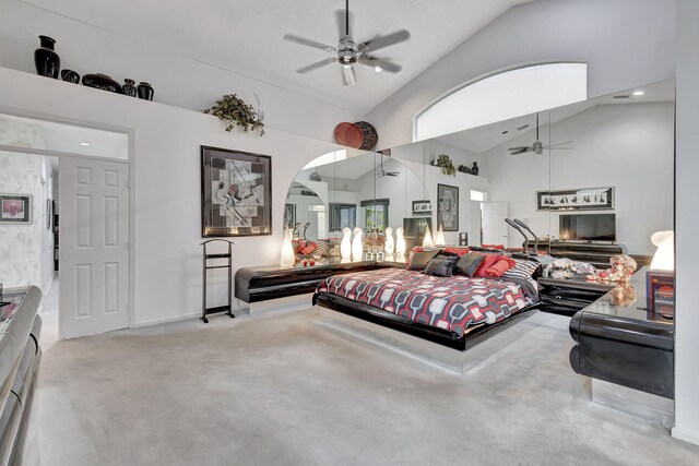 bedroom featuring ceiling fan and high vaulted ceiling