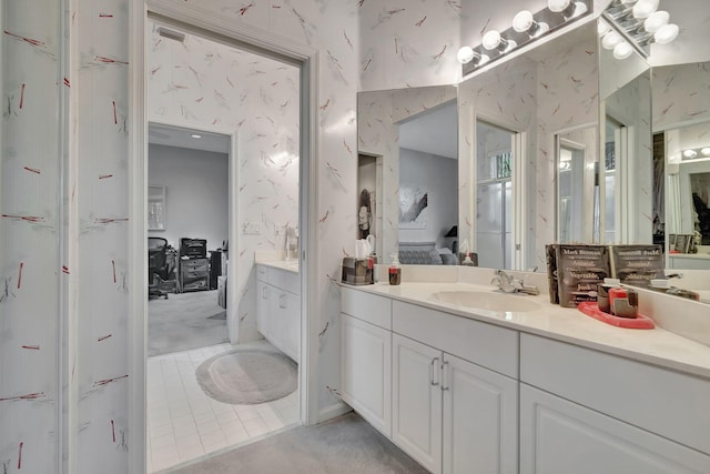 bathroom featuring vanity and tile patterned flooring