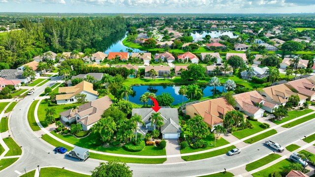 bird's eye view with a water view