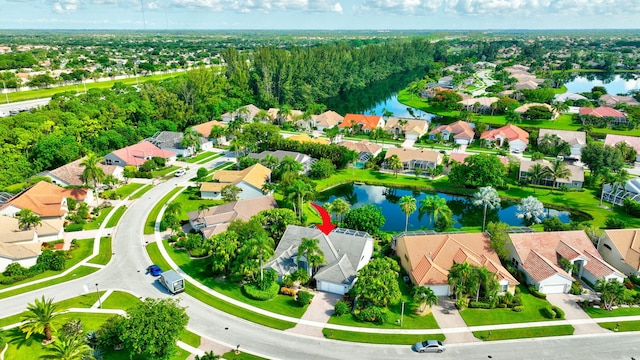 drone / aerial view with a water view