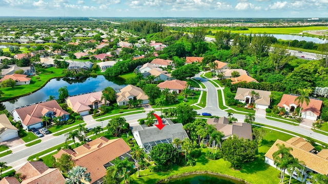 bird's eye view with a water view