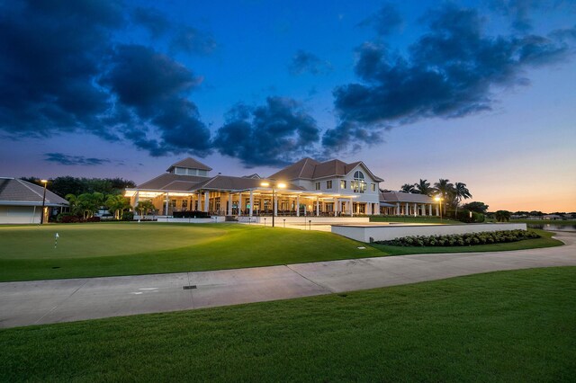 view of front of home with a lawn