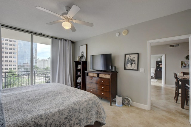 tiled bedroom featuring access to outside and ceiling fan