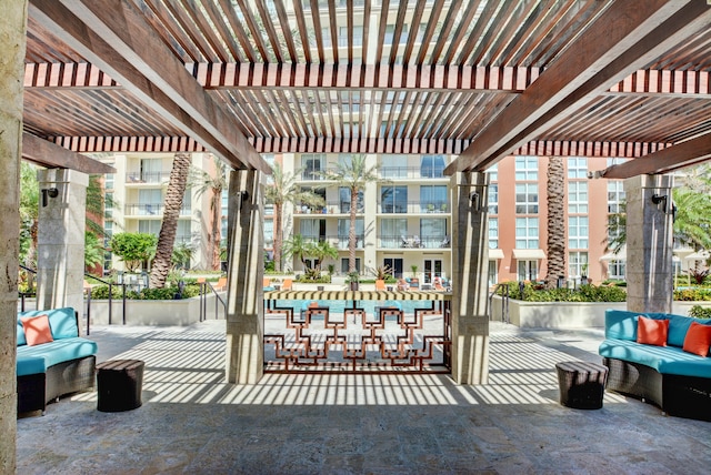 view of patio / terrace with outdoor lounge area and a pergola