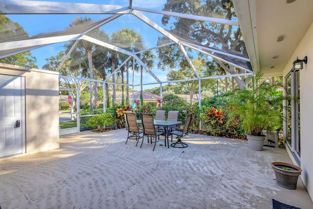 view of patio / terrace with glass enclosure