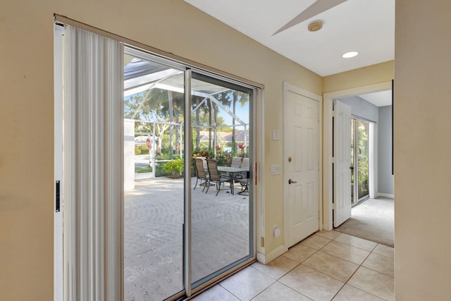 doorway featuring light tile patterned floors