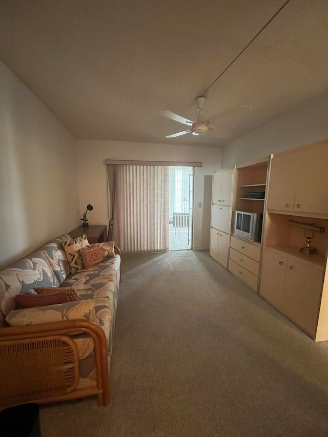 bedroom with light colored carpet and ceiling fan