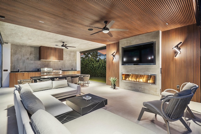 view of patio featuring outdoor lounge area and ceiling fan