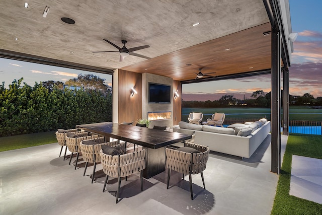 view of patio / terrace featuring an outdoor living space and ceiling fan