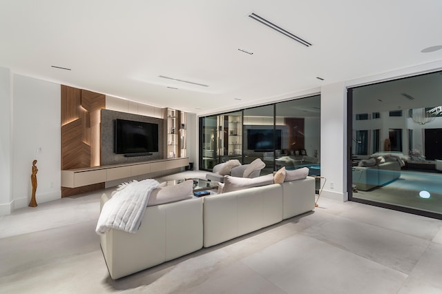 living room with floor to ceiling windows