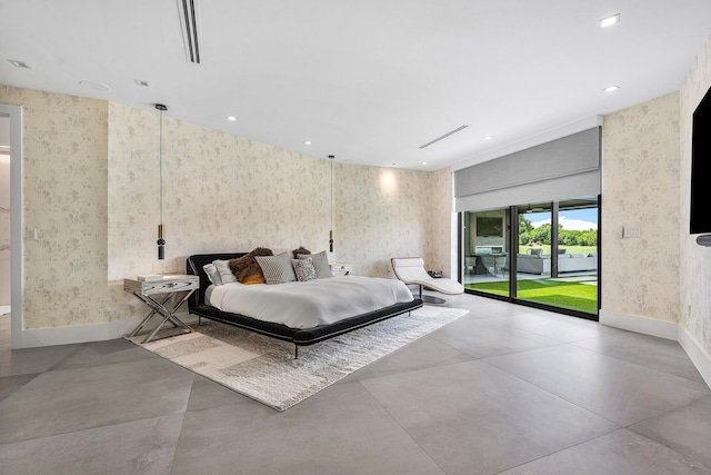 bedroom with light tile patterned flooring and access to outside