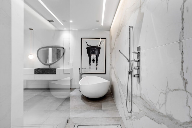 bathroom featuring tile walls and tile patterned floors