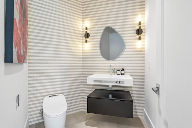 bathroom with sink and toilet