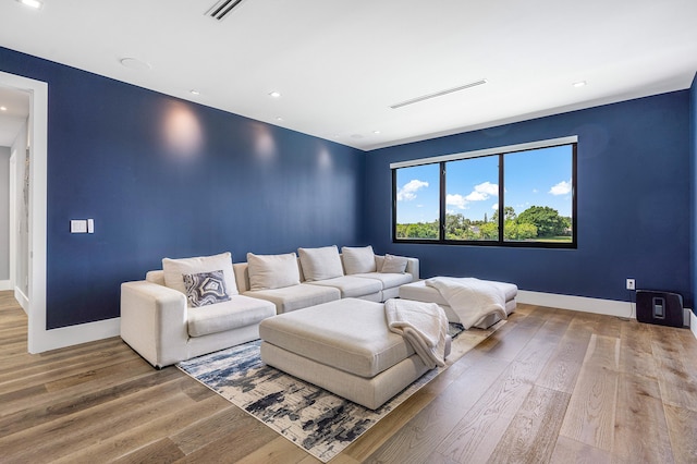 living room with wood-type flooring