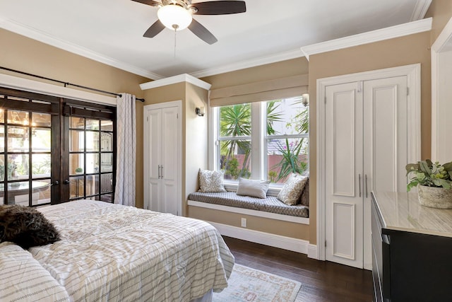 bedroom with dark wood-type flooring, multiple windows, ceiling fan, and crown molding