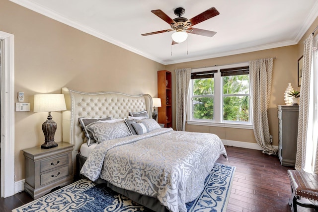 bedroom with ceiling fan, crown molding, and dark hardwood / wood-style flooring