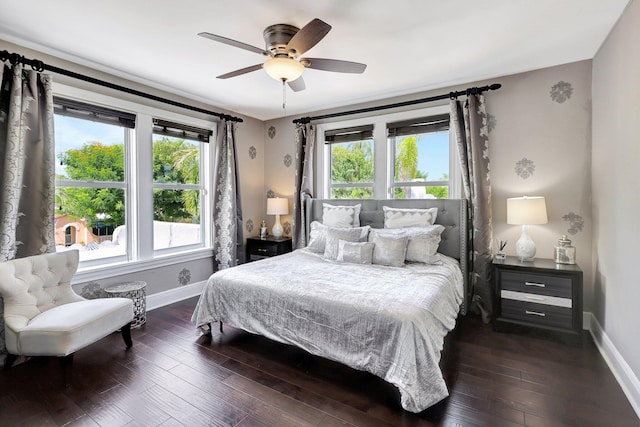 bedroom featuring ceiling fan and dark hardwood / wood-style flooring