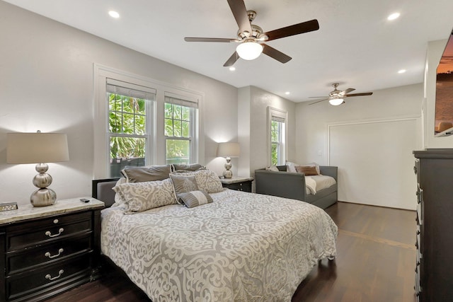 bedroom featuring ceiling fan and dark hardwood / wood-style flooring