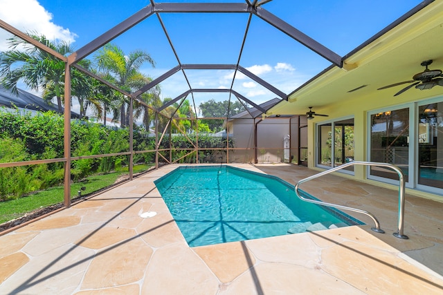 view of pool with ceiling fan and a patio area