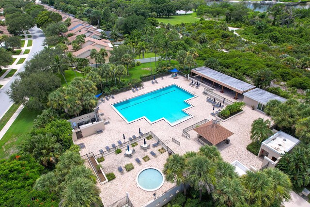 view of swimming pool with a patio area