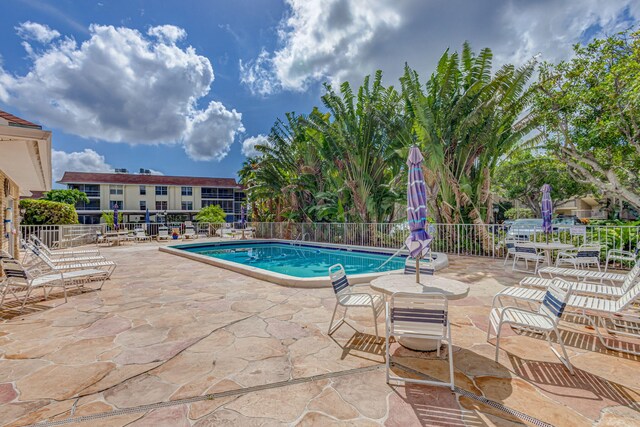 view of pool with a patio area