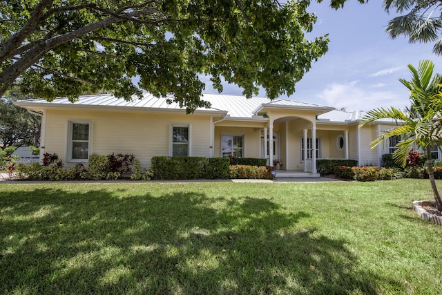 ranch-style house with a front lawn