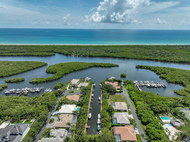 drone / aerial view featuring a water view