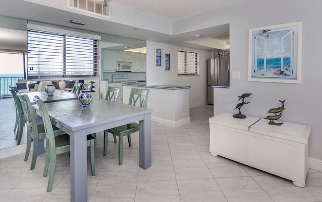 view of tiled dining area