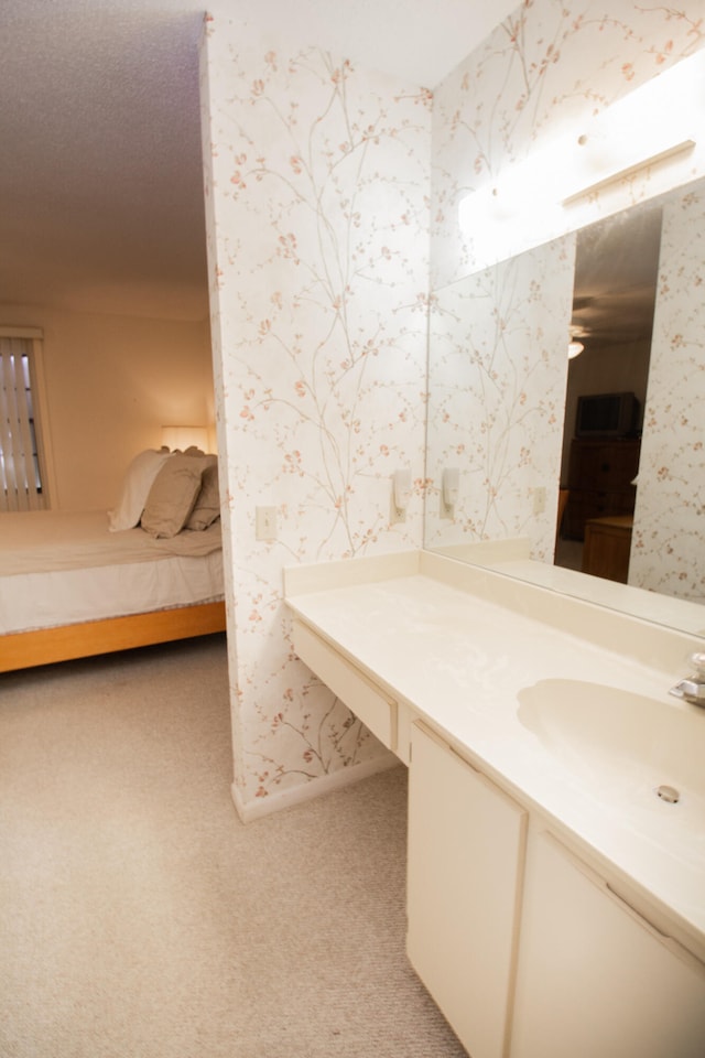 bathroom featuring vanity and ceiling fan