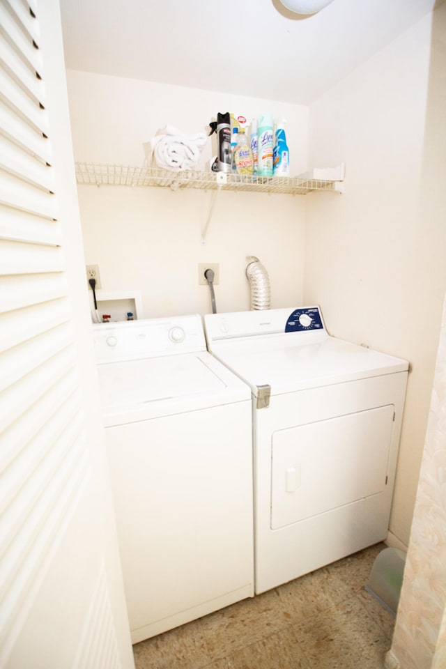 laundry area with washer and clothes dryer