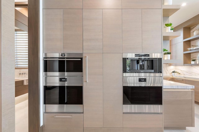 kitchen featuring stainless steel double oven