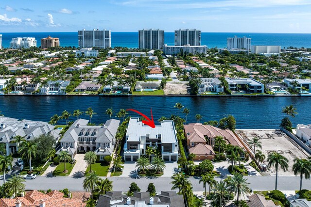 bird's eye view with a water view