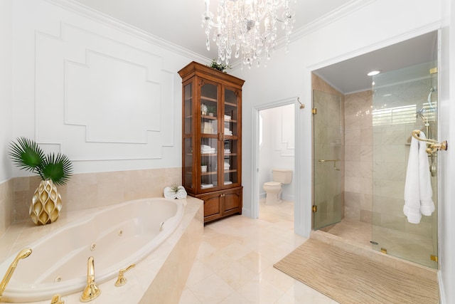 bathroom featuring ornamental molding, toilet, and separate shower and tub