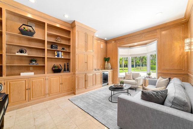 tiled living room with wine cooler and built in shelves