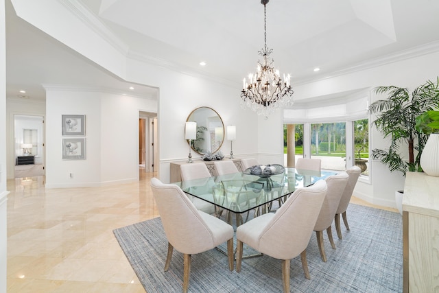 dining space featuring ornamental molding and a notable chandelier