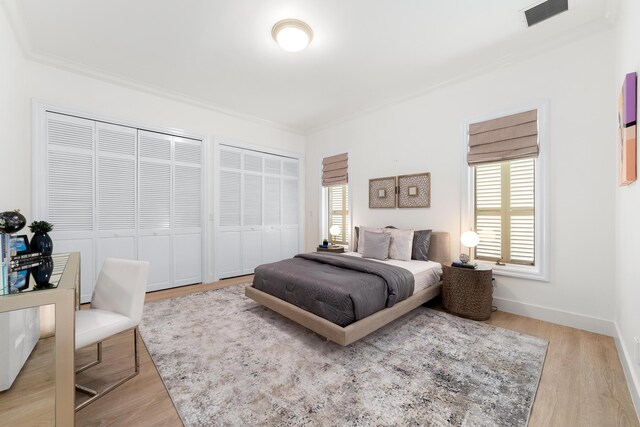 living room featuring built in shelves, wine cooler, and light tile patterned floors