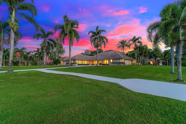 surrounding community featuring a lawn