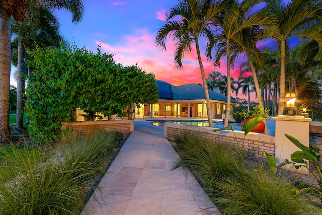 view of front of property featuring a patio